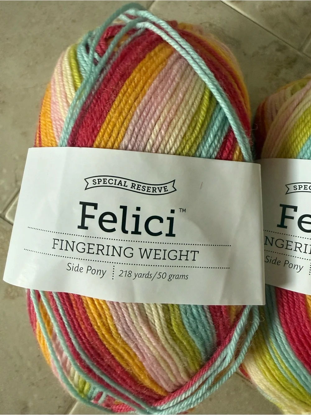 Felici Fingering Weight Yarn - Multicolor Pastel Stripes 2 Skeins Side Pony
